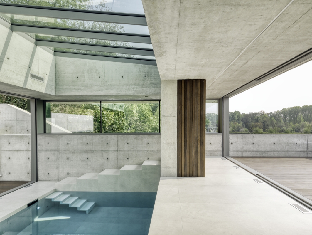 als lijnenspel glas, hout en schoon beton architectenweb.nl